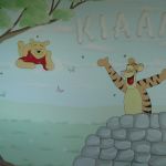 Disney style mural featuring Winnie the Pooh